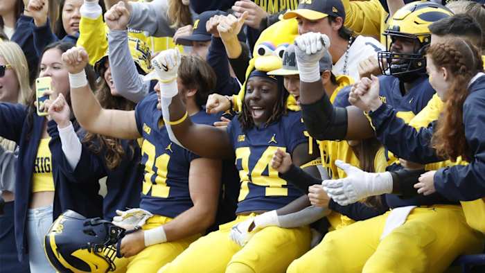 Sep 24, 2022; Ann Arbor, Michigan, USA; Michigan Wolverines players celebrate in the student section after the game against the Maryland Terrapins at Michigan Stadium. Mandatory Credit: Rick Osentoski-USA TODAY Sports
